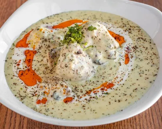 Doro Wat – slow-cooked Ethiopian chicken stew with berbere spice and boiled egg at Merkato Restaurant Winnipeg