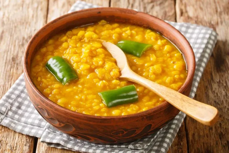 Ater Aletcha Wat mild Ethiopian yellow split pea stew with turmeric onion and garlic at Merkato Restaurant Winnipeg